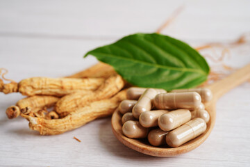 Ginseng roots and green leaf, healthy food.