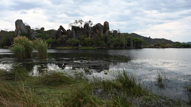 Matobo National Park, Zimbabwe, Africa.  Fresh water lake with beautiful rocky landscape