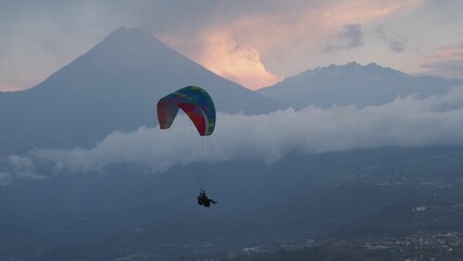 Beautiful view of paragliding with Andes mountains in the background