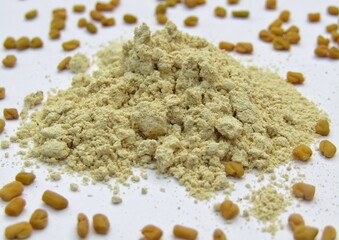 Fenugreek, powder on white background 
