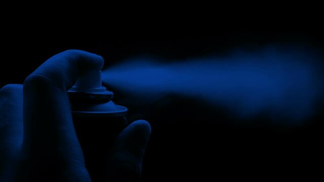 Spray Can Used At Night Closeup