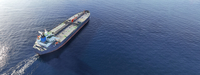 Aerial drone ultra wide panoramic photo of latest technology industrial crude oil - fuel tanker ship cruising deep blue Mediterranean sea