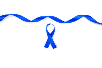 Top view photo of blue satin ribbon symbol of prostate cancer awareness on isolated old background