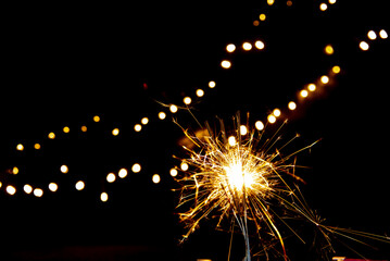 Fototapeta premium Den Helder, Netherlands. November 2022. Stars on a black background with bokeh.