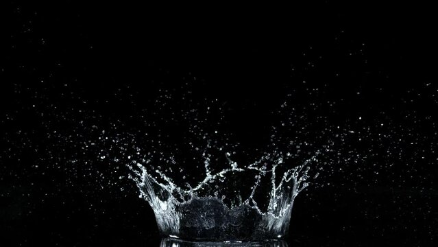 Super Slow Motion Shot of Water Crown Splash Isolated on Black Background at 1000fps.