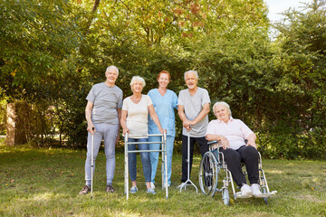 Physiotherapist and group of seniors with disabilities