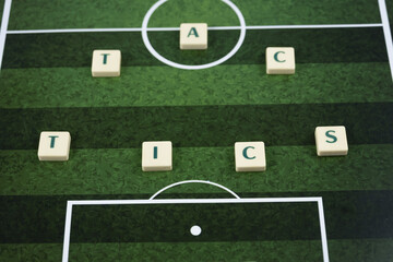 Tactics text on the football field, football terms banner idea, typographic soccer concept, simple design, football field