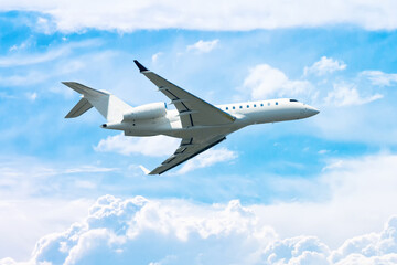Naklejka na ściany i meble White modern executive airplane fly in the sky