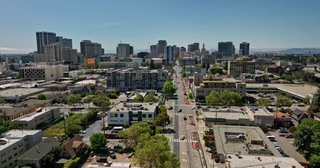 Oakland California Aerial v1 flyover above telegraph avenue connecting broadway capturing downtown cityscape, rising reveals alameda island and san francisco bay - Shot with Mavic 3 Cine - April 2022