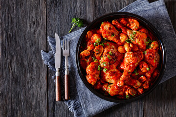 chicken stew with mushrooms in a tomato sauce