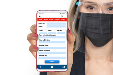 Businesswoman showing convenience of using smartphone application to claim health insurance.