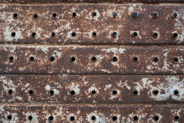 iron that is rusty and has many 