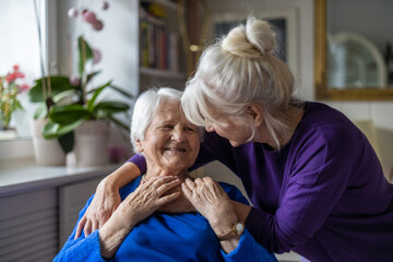 Woman hugging her elderly mother
- 551511682