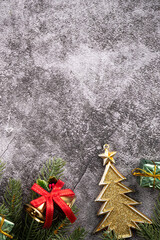 Christmas background design concept with beautiful decors, tree branch and golden bell.