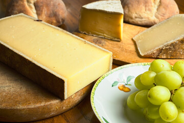 French cheese. A table with comté cheese