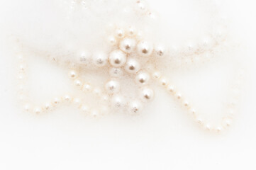 Pearl beads in foam. top view
