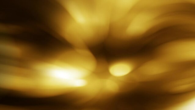Dark background, blurry abstract yellow flickers motion