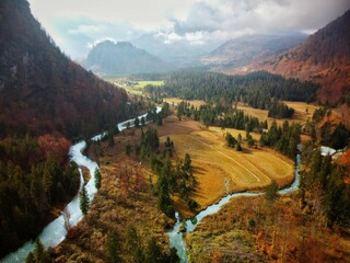 Aerial view of beautiful Grunau im Almtal village with rivers and lush vegetation in Austria