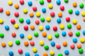 colorful candies as background top view. Seamless pattern with candy. Many sweet candies close-up