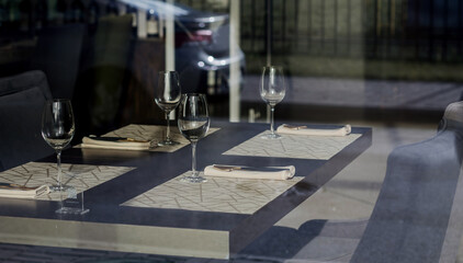 restaurant table with empty glasses