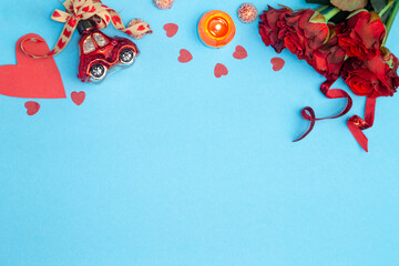 Blue background for Valentine's Day with decor details, flat lay.