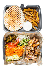 Doner kebab Shawarma on a plate with french fries and salad in box to go, take away. , isolated,...