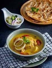 yellow curry chicken with homemade roti