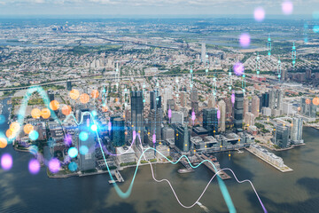 Aerial panoramic helicopter city view of New Jersey City financial Downtown skyscrapers. Forex graph hologram. The concept of internet trading, brokerage and fundamental analysis