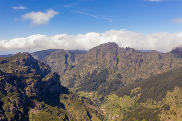Drone view of mountains buried in clouds