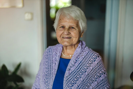 Portrait of an elderly woman in her home
