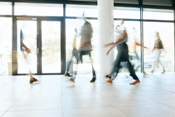 Motion blur, busy office and business people walking, moving or fast speed in workplace, startup company or agency. Group of workers, crowd and employees rush movement in lobby, building and hallway