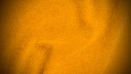 Yellow velvet fabric texture used as background. Empty yellow fabric background of soft and smooth textile material. There is space for text...