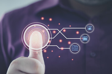 Men use their thumbs to scan fingerprints or for digital processing biometric identification to access security systems including internet banking, educational history, and medical history.