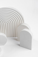 White props for product photography on white seamless background - half-circles, oval doors, rippled arch, zig-zag stairs