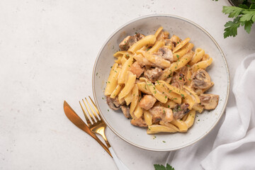 Pasta with chicken and cream mushroom sauce