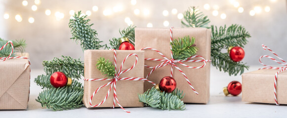 Christmas gift boxes. Craft paper and red ribbon