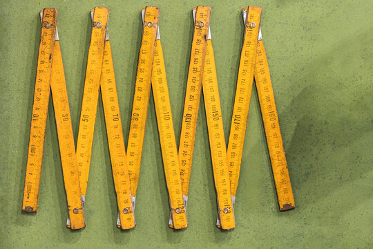 Folding ruler on green table