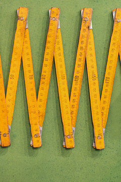 Folding ruler on green table