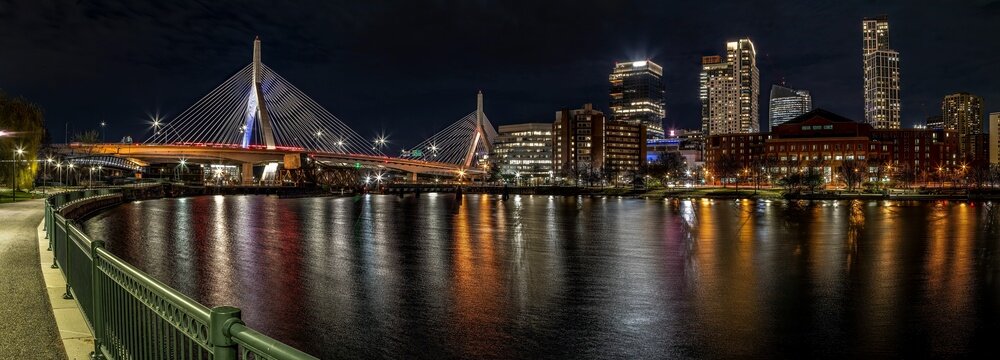 Panoramic view of the Zakim cable-stayed bridge at night in Boston, Massachusetts.