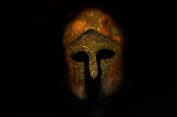 Ancient Viking warrior's helmet from the Bronze Age isolated on a black background