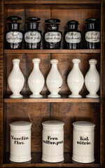 Bottles with drugs from old medical, chemical and pharmaceutical glass. Chemistry and pharmacy...