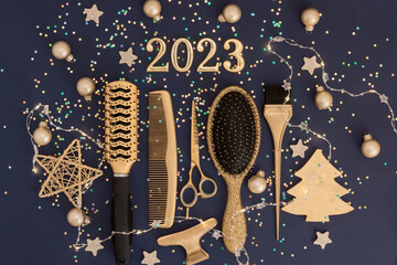 Figures 2023 scissors and comb with confetti on a dark background. Greeting card of hairdresser or...