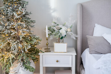Living room in Scandinavian style with a Christmas decor. Holiday background. New Year