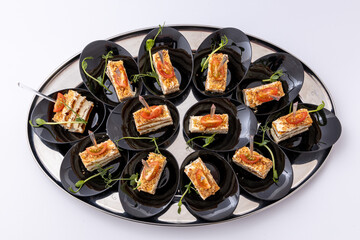Party platter of bite size appetisers. Appetizer canape. Catering