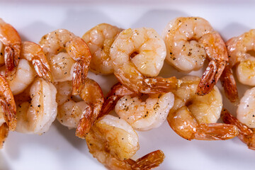 Cooked shrimps on plate. Close up