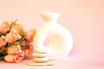vase with flowers pink roses on pink background, health, spa, relaxation 