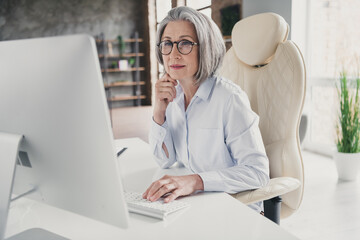 Photo portrait of pensioner retired old woman typing online conference manager dressed white shirt...