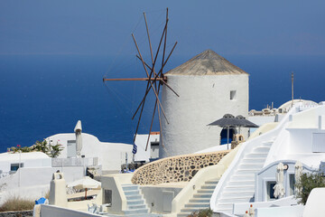 Windmill in Santorini, Greece. - obrazy, fototapety, plakaty