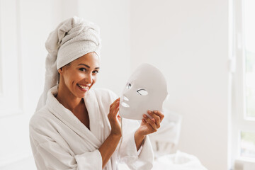 Woman Getting A Led Light Facial Mask Treatment At The Beauty Salon