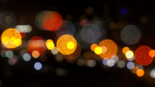 Defocused colorful glowing cityscape lights